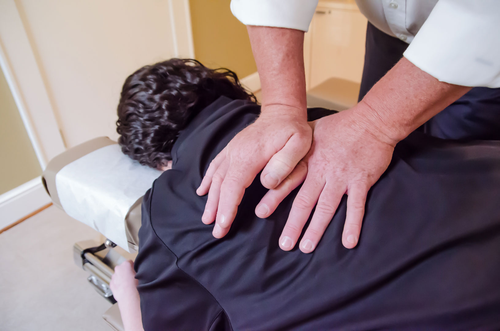 Patient receiving chiropractic treatment at Ball Chiropractic Clinic, P.C.